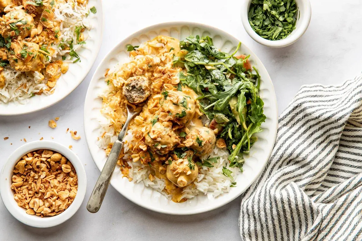 Yellow Curry Meatballs with Peanut Shallot Crispies